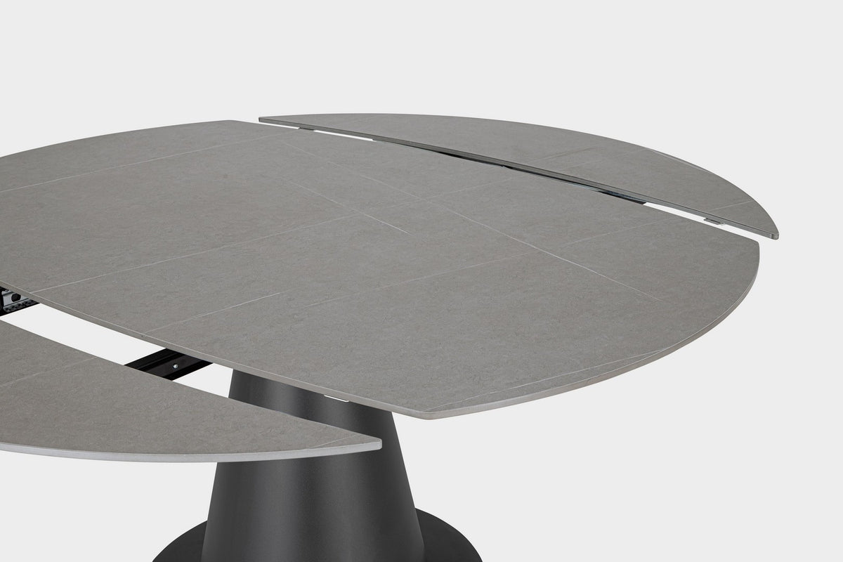 Tavolo allungabile da ovale a rotondo in gres effetto marmo 160x102 cm